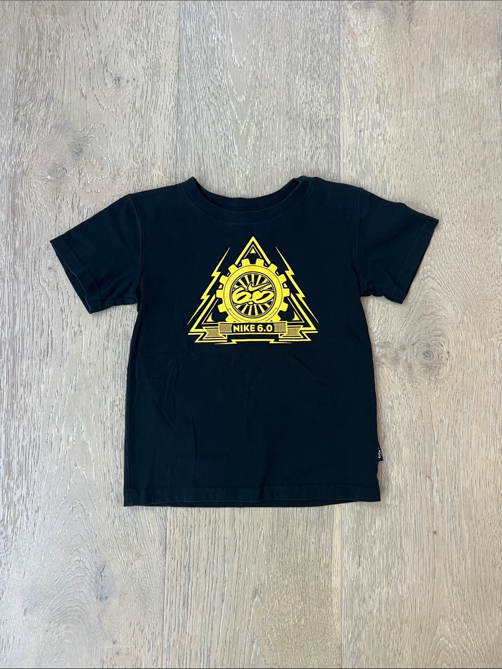Nike Black Short Sleeve Tee with Yellow Geometric Graphic. Size 5.